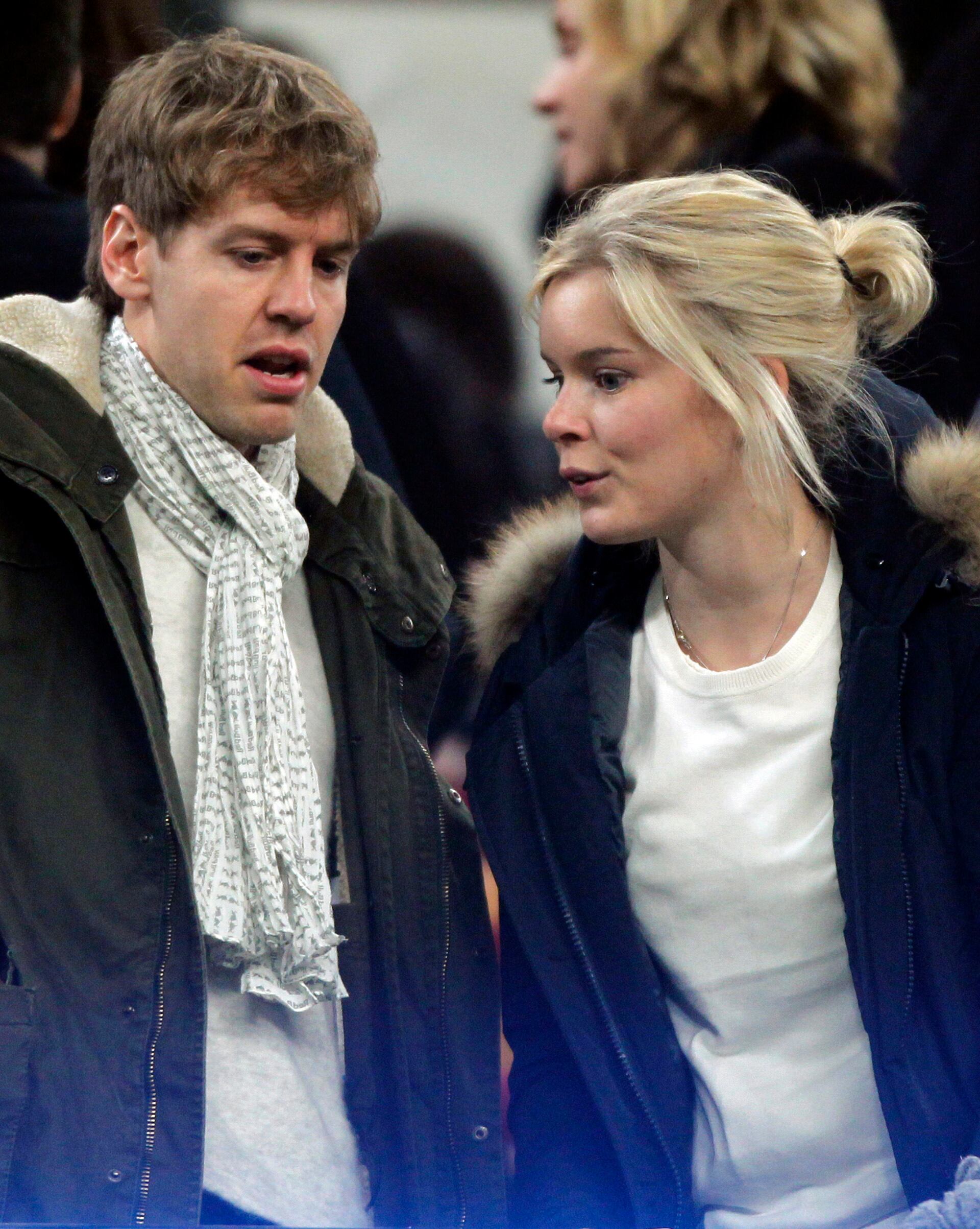 Sebastian Vettel y Hanna Prater en el Camp Nou para el duelo entre Barcelona y Valencia en 2012 (Reuters)