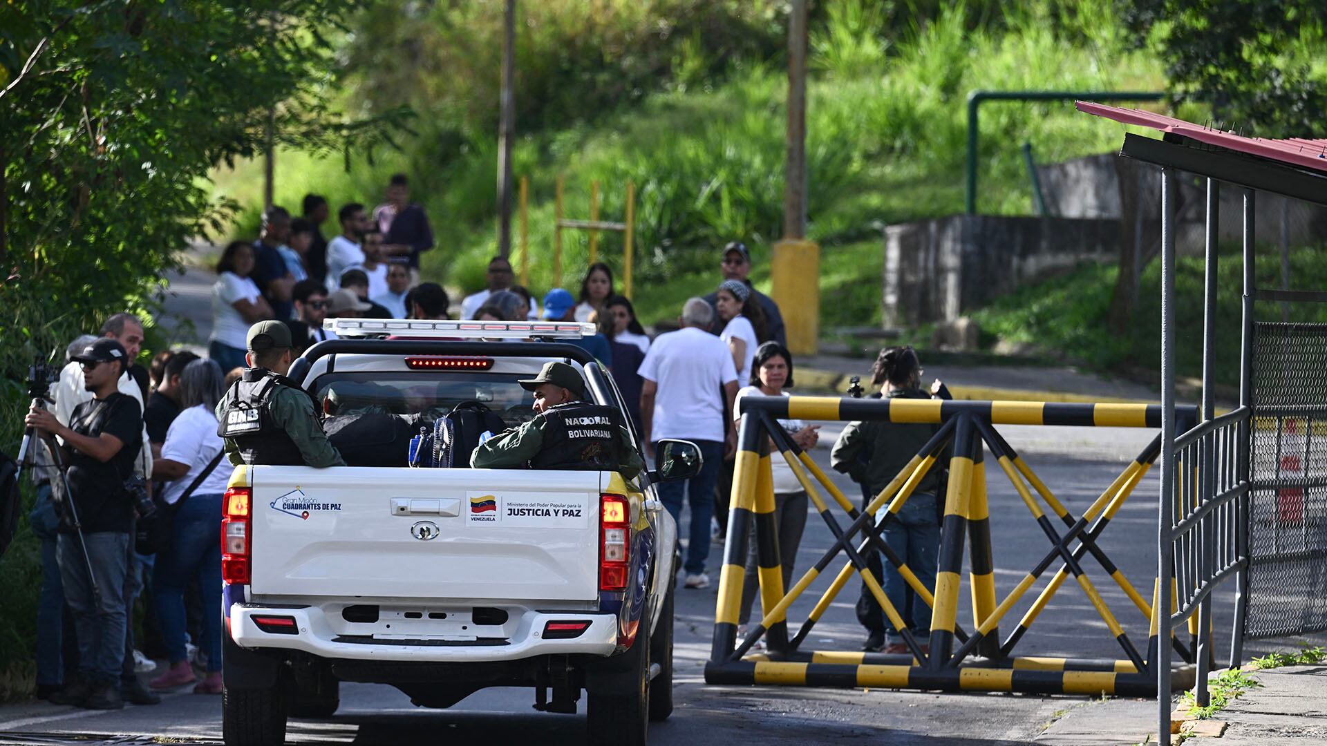 Relatives of prisoners queue outside El Rodeo I prison in Guatire, Miranda State, some 30 kilometers east of Caracas on January 11, 2026. Venezuelans were waiting for more political prisoners to be released, as ousted president Nicolas Maduro defiantly claimed from his US jail cell that he is