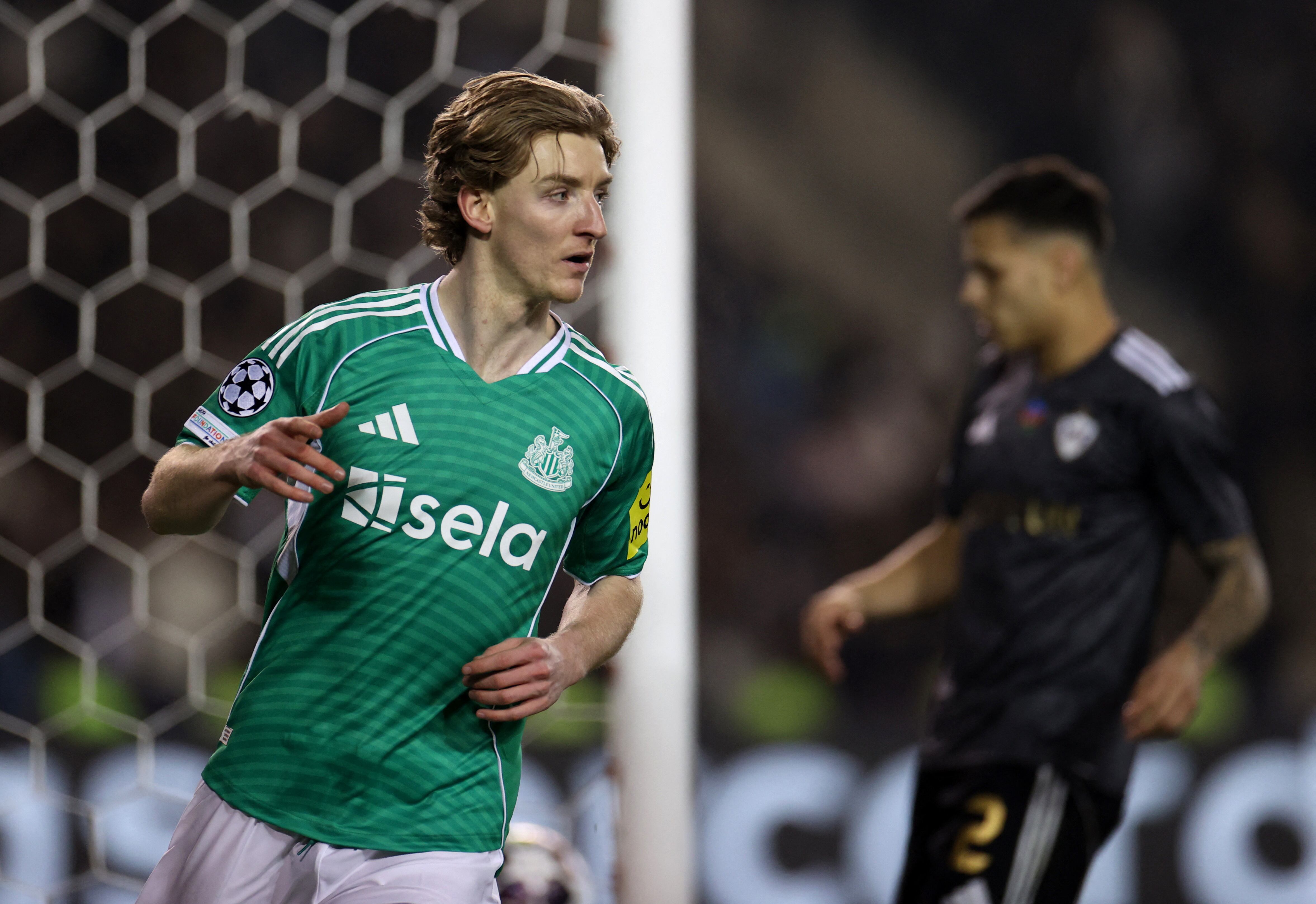 Soccer Football - UEFA Champions League - Play Off - First Leg - Qarabag v Newcastle United - Tofiq Bahramov Stadium, Baku, Azerbaijan - February 18, 2026 Newcastle United's Anthony Gordon celebrates scoring their fifth goal REUTERS/Aziz Karimov