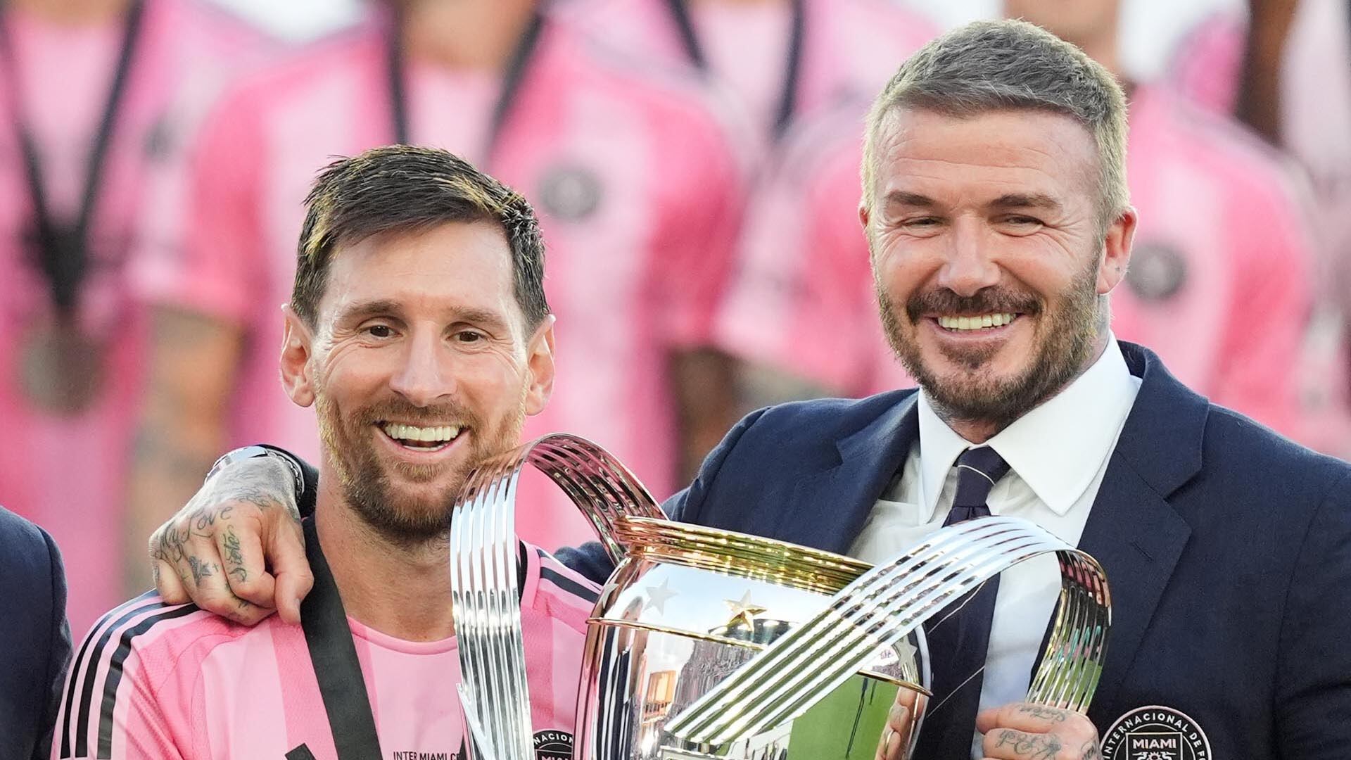 David Beckham poses with the MLS Cup trophy with Inter Miami forward Lionel Messi Saturday, Dec. 6, 2025, in Fort Lauderdale, Fla. (AP Photo/Rebecca Blackwell)