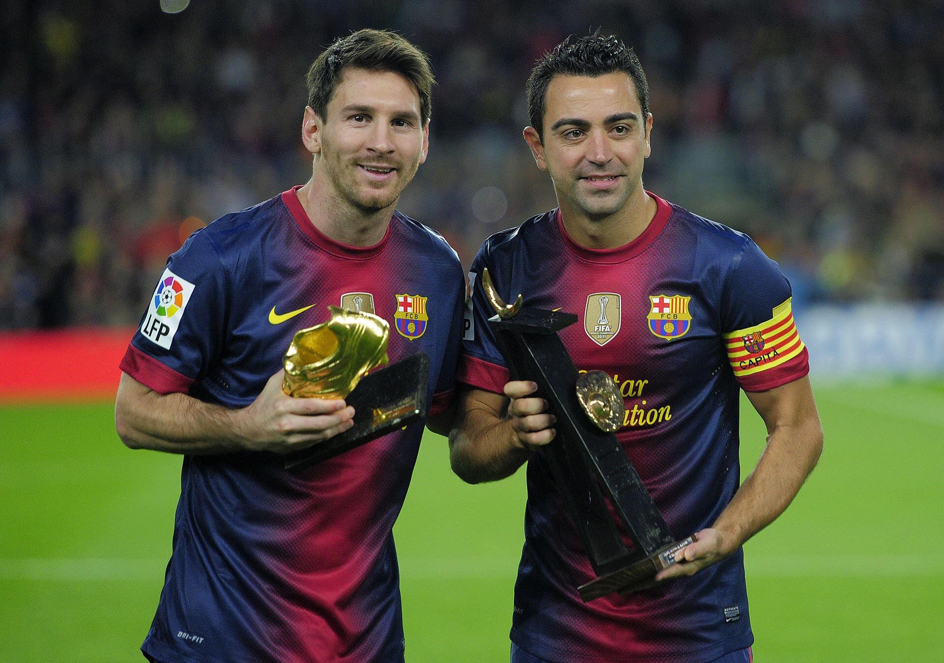 Messi y Xavi, juntos en Barcelona (AFP PHOTO / JOSEP LAGO)