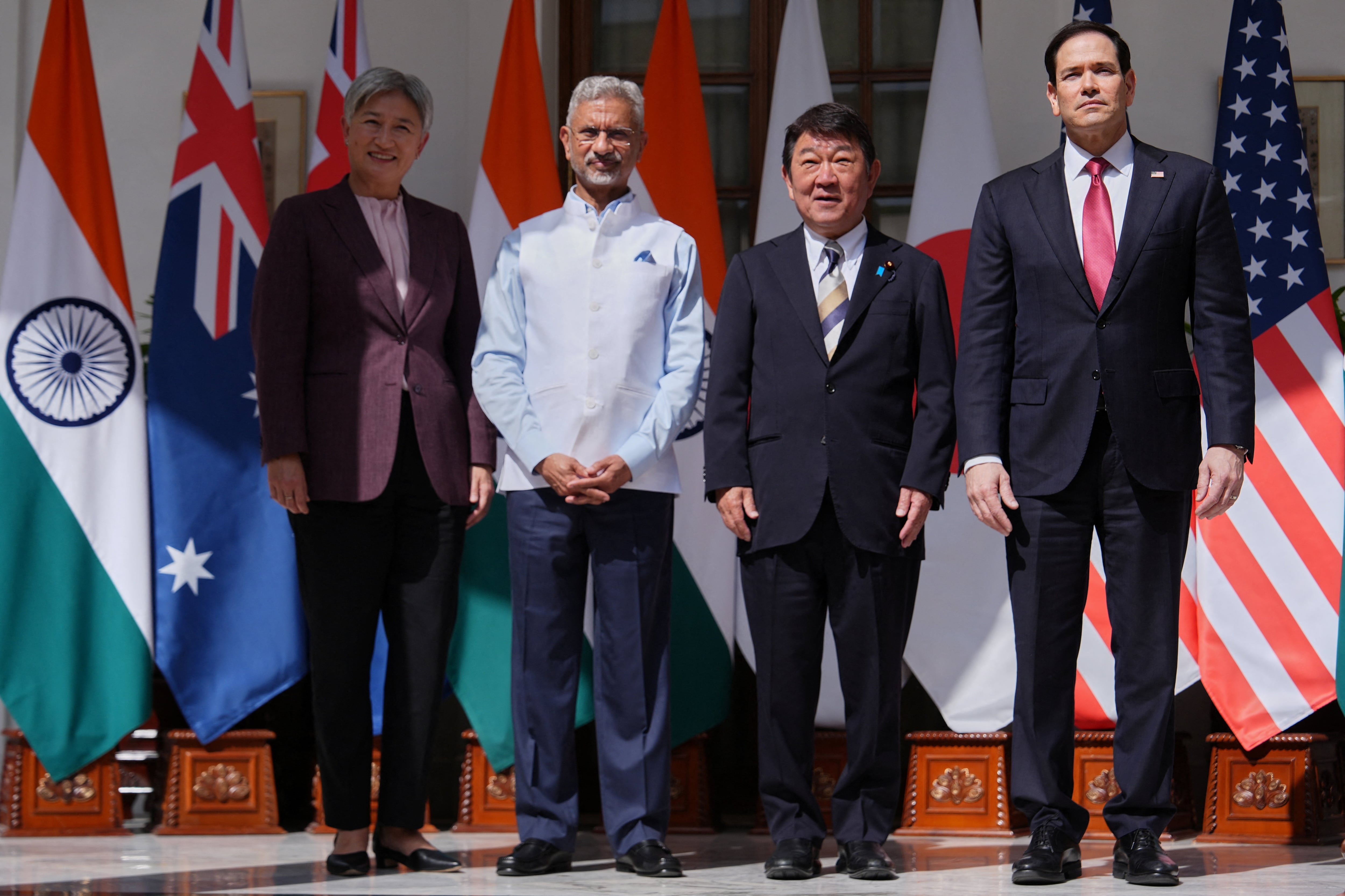 De izquierda a derecha, la ministra de Asuntos Exteriores de Australia, Penny Wong; el ministro de Asuntos Exteriores de la India, S. Jaishankar; el ministro de Asuntos Exteriores de Japón, Toshimitsu Motegi, y el secretario de Estado de EEUU, Marco Rubio, posan tras una reunión ministerial del Quad en la Hyderabad House de Nueva Delhi (India), el martes 26 de mayo de 2026 (REUTERS)