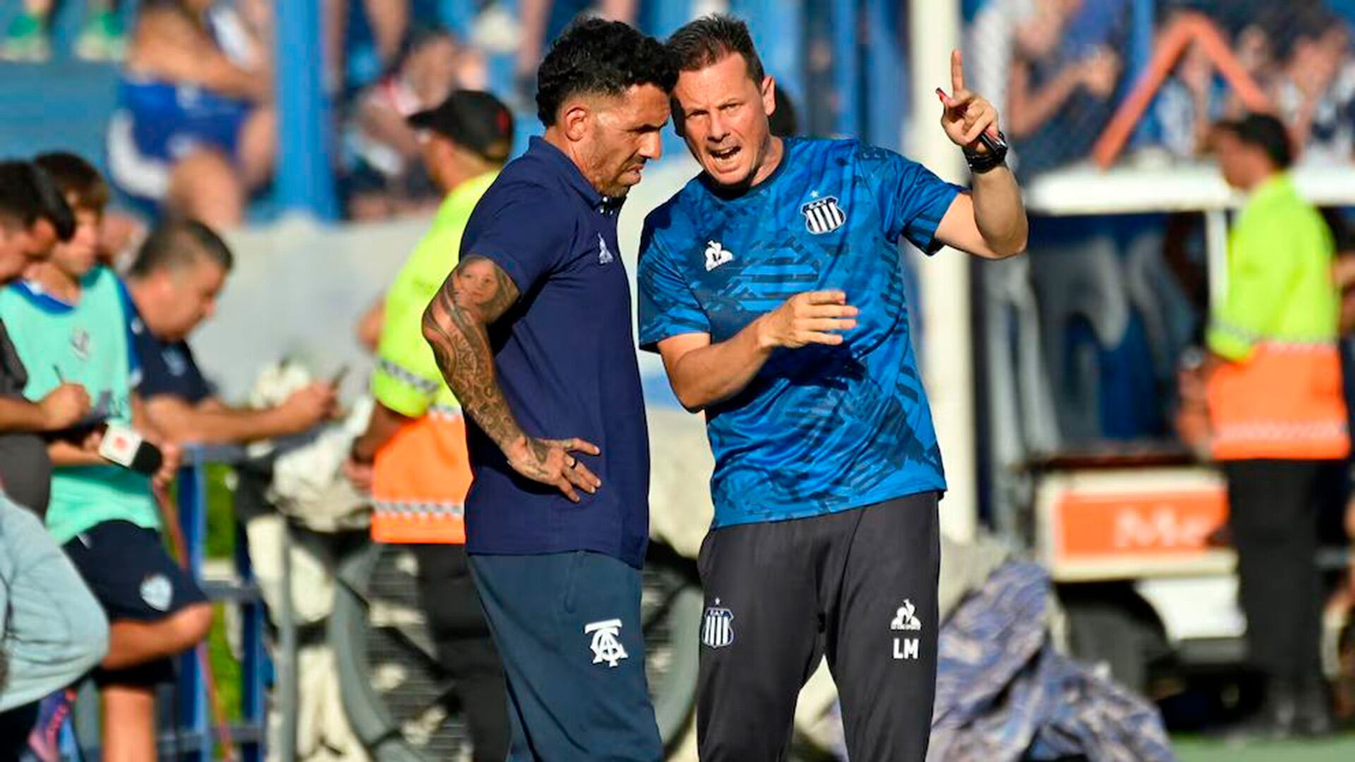 Luca Marcogiusseppe junto a Carlos Tevez durante el paso de ambos por Talleres