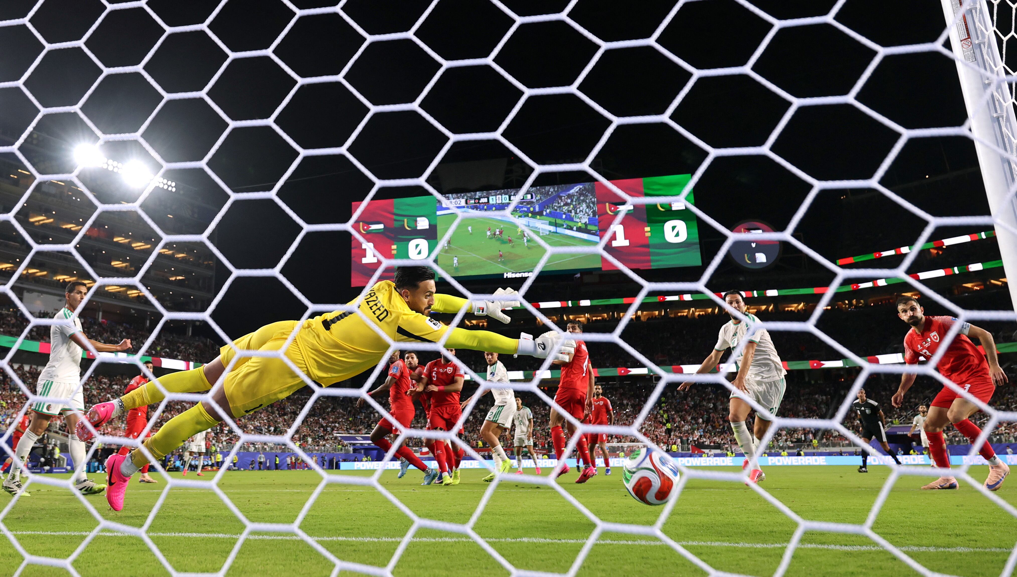 Soccer Football - FIFA World Cup 2026 - Group J - Jordan v Algeria - San Francisco Bay Area Stadium, Santa Clara, California, U.S. - June 22, 2026 Algeria's Nadhir Benbouali scores their first goal REUTERS/Carlos Barria