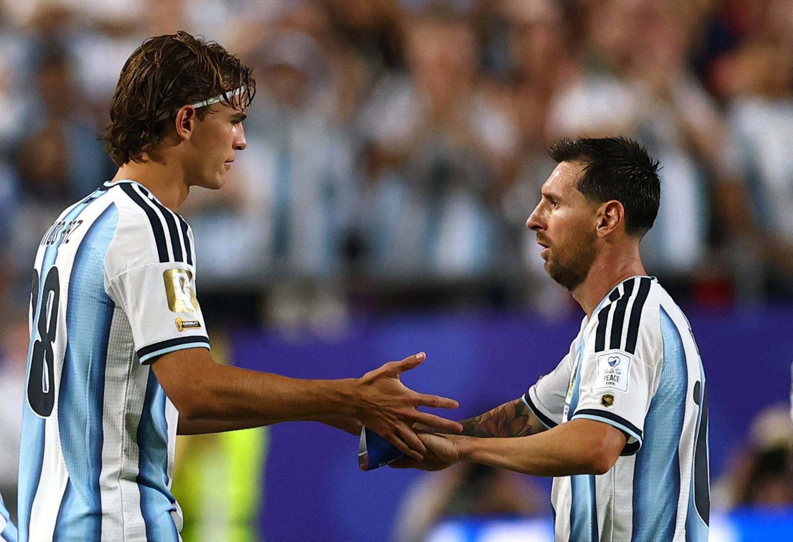 FOTO DE ARCHIVO. Fútbol - Copa Mundial de la FIFA 2026 - Grupo J - Argentina vs. Argelia - Estadio Kansas City, Kansas City, Missouri, EE. UU. - 16 de junio de 2026. Nico Paz, de Argentina, entra como suplente en lugar de Lionel Messi. REUTERS/Claudia Greco