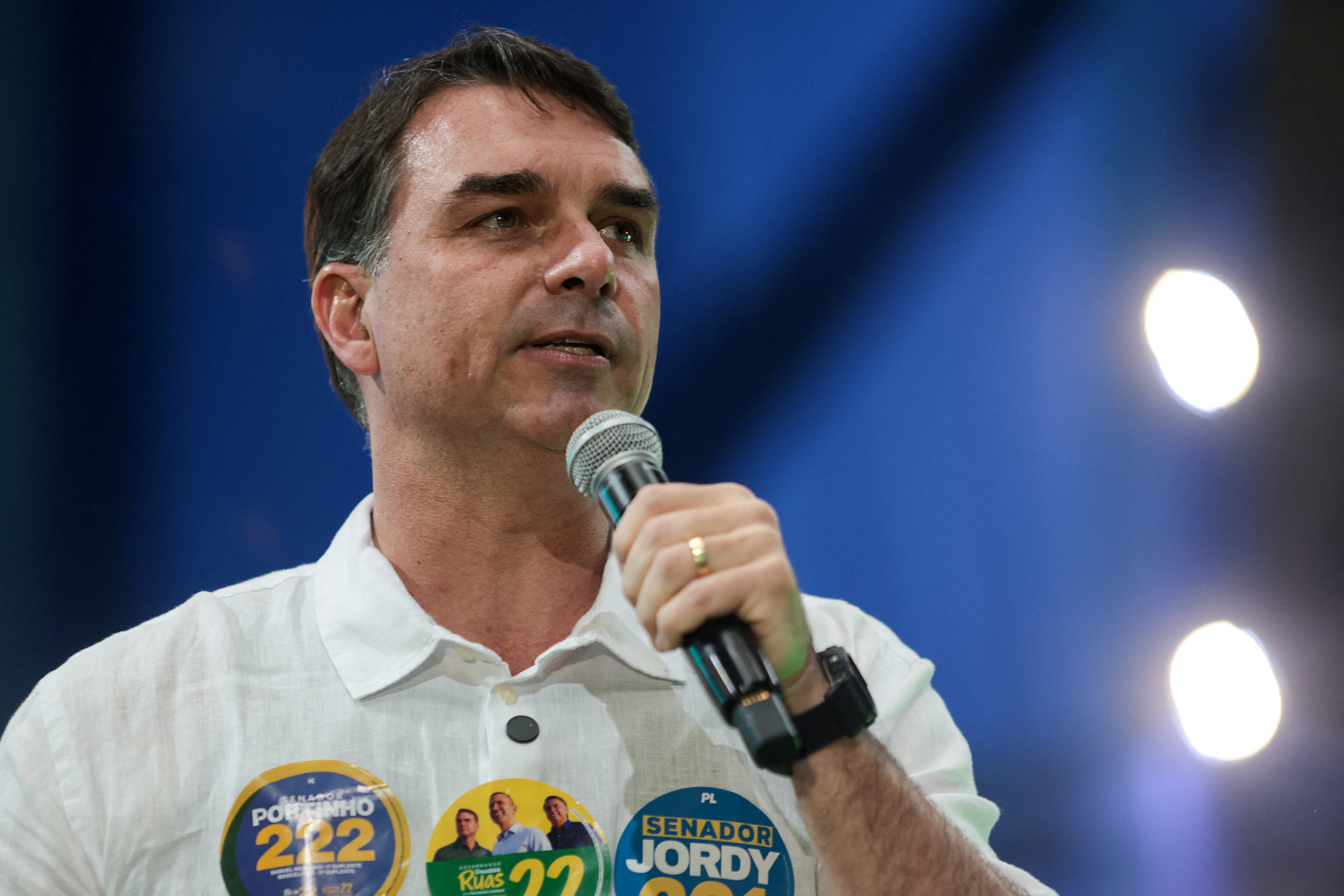 Brazilian presidential candidate and senator Flavio Bolsonaro speaks at an event to launch the gubernatorial campaign of state candidate Douglas Ruas, at Maracanazinho in Rio de Janeiro, Brazil, August 22, 2026. REUTERS/Tita Barros