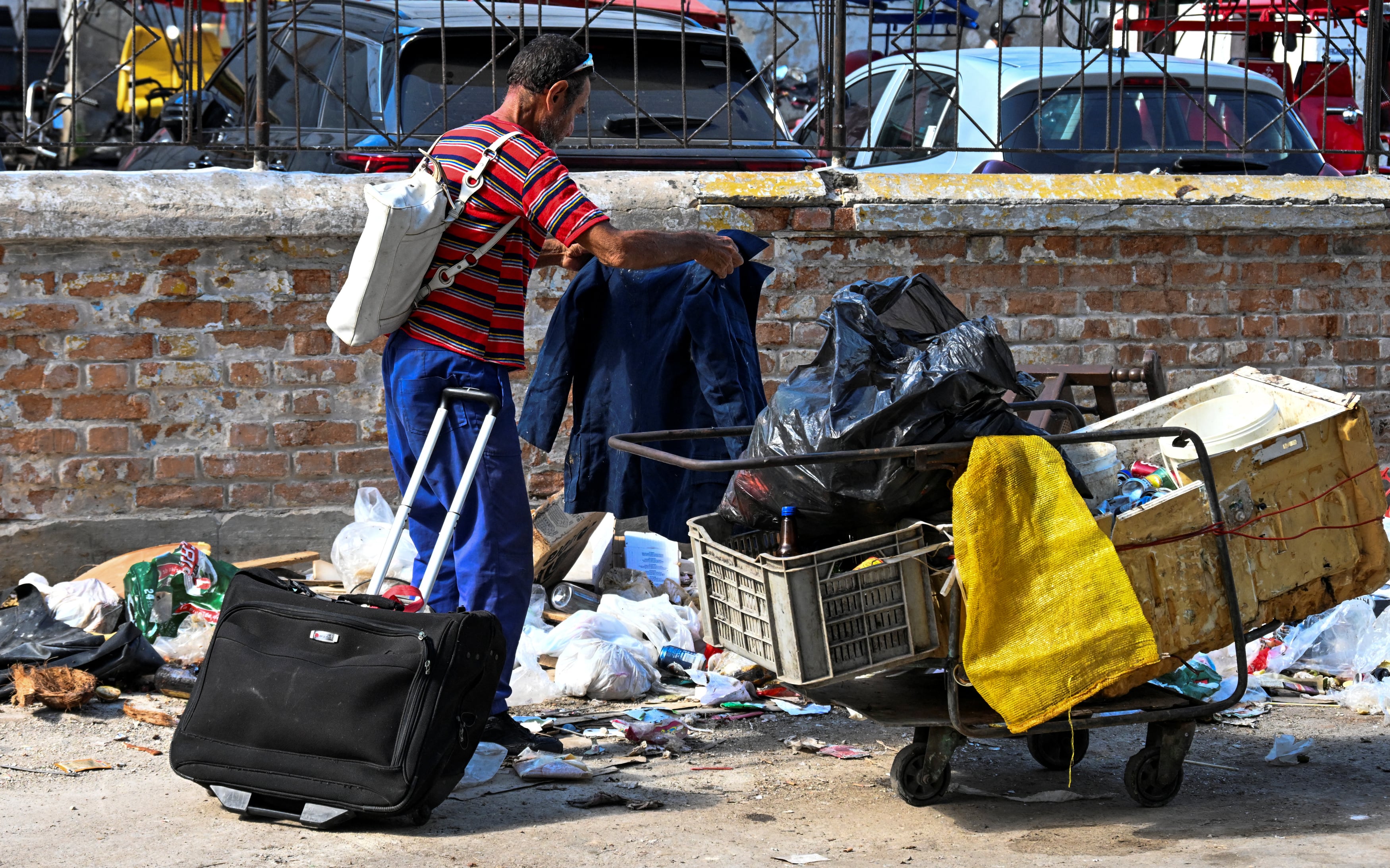 El Noveno Informe sobre el Estado de los Derechos Sociales indicó que el noventa y cuatro por ciento de la población vive en pobreza extrema. (Photo by Yamil LAGE / AFP)
